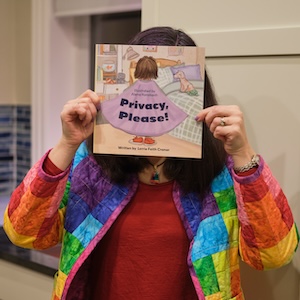 person holding Privacy,
Please! book