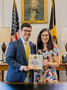Lorrie and Pittsburgh
					    Mayor Corey O'Connor
					    holding Privacy, Please!
					    book in mayor's office